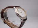Another side angle view of the Tissot PR 50 watch, highlighting the case profile and brown leather strap.