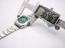 Digital caliper measuring the width of the Seiko 7006-5070 case, showing a reading of 36.46 mm.