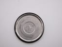 Interior view of the stainless steel case back, showing the polished finish.