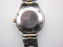Close-up of the polished stainless steel case back, showing 'SEIKO WATER RESIST ST. STEEL 2906-0330' engraving and serial number.