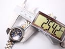 Digital caliper measuring the case diameter of the Seiko watch, displaying 25.42 mm.