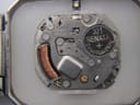 Macro close-up of the Seiko 2A32A quartz movement inside the watch, with a freshly installed Renata 321 battery visible.