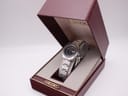 Side profile of Seiko 2906-0170 showing integrated tonneau-shaped stainless steel case, flat mineral crystal, and crown at 3 o'clock position