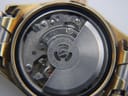 Macro shot of the Seiko automatic movement, showing the rotor, jewels, and 'Japan' engraving.