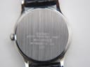 Another angled side view of the Seiko Spirit watch, displaying the watch's elegant curve and strap.