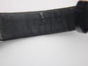 Close-up of the inside of the black leather strap, with "SEIKO" embossed clearly.
