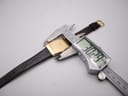Digital caliper measuring the width of the Seiko watch case, showing 30.29mm.