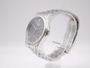 Angled side view of the Seiko quartz watch showing the case profile and crown.