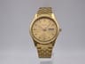 Seiko 7N43-9011 vintage men's gold tone quartz watch with day-date display and integrated bracelet