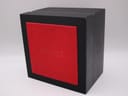 Exterior view of a black display box with a red top, embossed with "SEIKO".