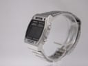 Right-side angle view of the Seiko A229-5060, highlighting the pushers and the integrated stainless steel bracelet.