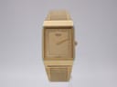 Front view of gold tone Seiko 6530-5430 watch inside a black and red Seiko presentation box.