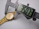 Digital caliper measuring the case diameter of the Seiko watch, showing 35.07mm.