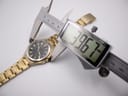 Overhead view of the Seiko watch with a digital caliper measuring the case diameter at 39.67mm.