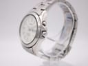 Angled side view of the Seiko Kinetic watch showing the stainless steel case, crown, and pusher on the right side.