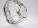 Angled side view of the Seiko Kinetic watch showing the stainless steel case and integrated bracelet on the left side.