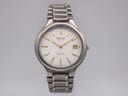 Seiko titanium watch with white dial in a black and white presentation box.
