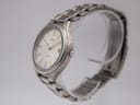 Side profile view of the Seiko titanium watch showing the subtle curve of the case and integrated bracelet.