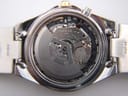 Close-up of the Seiko 5M62A Kinetic movement inside the watch, showing the rotor and internal components.