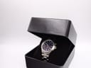 Seiko Kinetic watch displayed in a black presentation box.