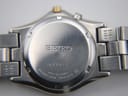 Close-up of the polished stainless steel case back, engraved with 'SEIKO', serial number '670861', 'WATER RESISTANT', 'MOVEMENT JAPAN', and '5M62-0C70'.