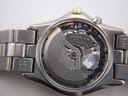 Close-up view of the Seiko 5M62A Kinetic movement inside the watch, showing the oscillating weight, 'TIME CORP, JAPAN 2', and '6 JEWELS' markings.