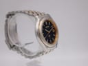Side view of the Seiko Kinetic watch highlighting the curved case profile and integrated bracelet.