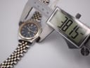 Digital caliper measuring the case diameter of the Seiko watch, displaying 38.15 mm.