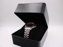 The Seiko Kinetic watch presented in a generic black watch box.