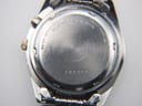 Close-up view of the stainless steel case back, engraved with 'SEIKO WATER RESISTANT ST.STEEL + BASE METAL 5M42-0B80 A4' and serial '781357'.