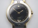 Detailed close-up of the Seiko Creo black textured dial, showing gold-tone Roman numerals, dot indices, and date window.