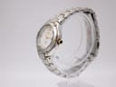 Side view of the Seiko Coutura watch showcasing the two-tone case and integrated bracelet.