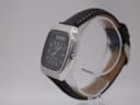 Angled right-side view of the Seiko H556-5030 watch, showing crown and case profile on a stand.