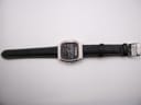 Top-down view of the Seiko H556-5030 watch with black leather strap laid flat.