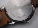 Close-up of the stainless steel case back, showing Seiko branding, serial number (762353), model number (7N42-0GE0), water resistance (10 BAR), and 'stainless steel'.