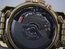 Detailed view of the Seiko 5M62P Kinetic movement with rotor visible, showing "SEIKO TIME CORP. JAPAN 2 SIX 6 JEWELS" engraving.