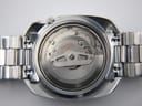 View of the Seiko 6119 automatic 21 jewels movement with its rotor, visible after case back removal.