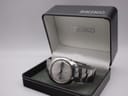The Seiko 6119-7080 watch resting in its original black Seiko presentation box.
