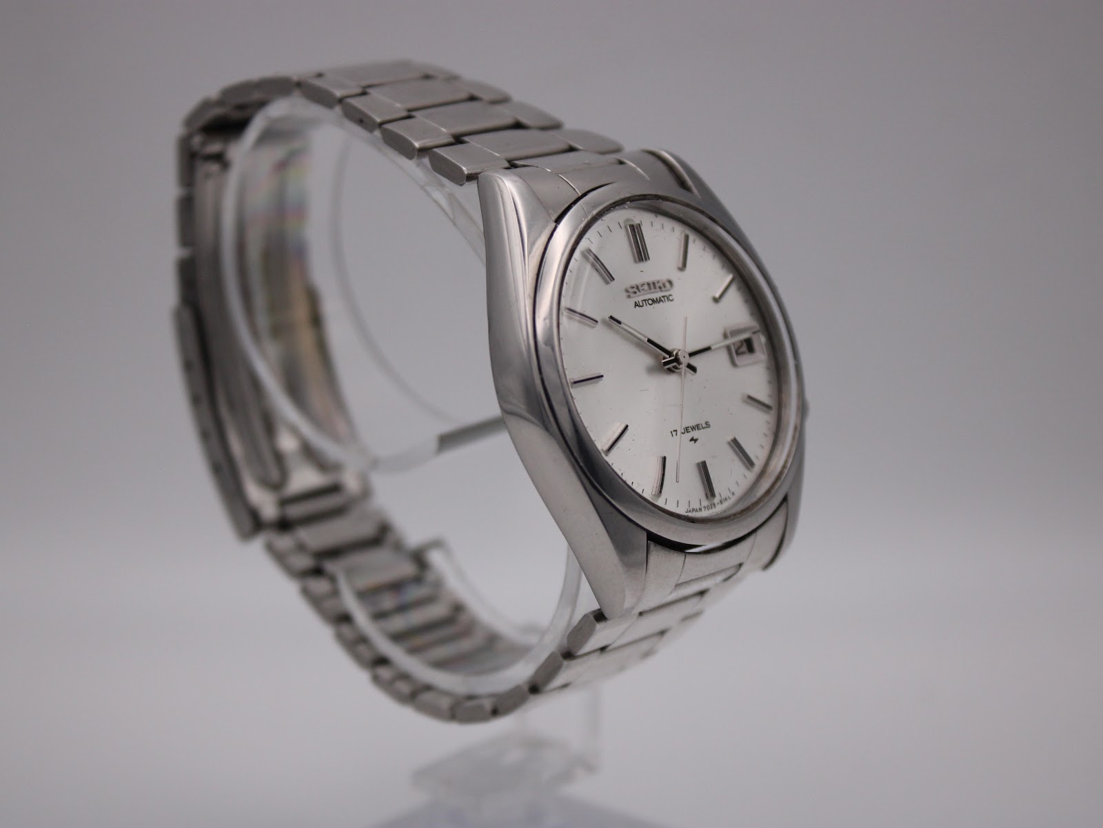 Close-up of the vintage Seiko watch's stainless steel case back with model and serial numbers.