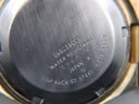 Detailed view of the Seiko 6119-5490 dial, highlighting the day-date window and applied indices.