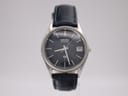 Front view of the Seiko 8222-7000 vintage quartz watch with navy dial and leather strap.