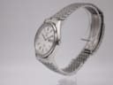 Close-up of the Seiko 8223-8080 stainless steel case back with serial number, "water resistant", and model designation.