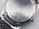 Digital caliper measuring the Seiko 8223-8080 watch case, showing an exact diameter of 34.77mm.