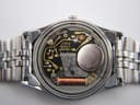 Detailed view of the Seiko 7123A quartz movement with 'TWO 2 JEWELS JAPAN' visible, and a freshly fitted Renata 390 battery