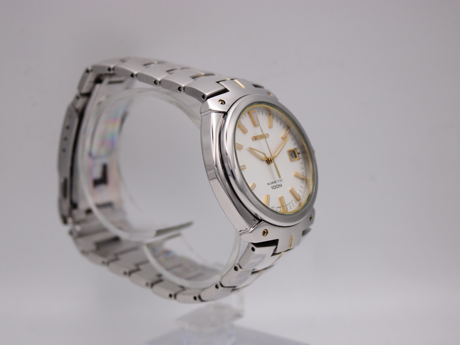 Another angled view of the Seiko watch from the side, highlighting the polished case.