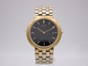 Front view of the vintage Seiko 7N29-7A00 watch with black dial and gold-tone case.