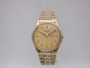 Front view of the Seiko 7N43-8A30 gold-tone quartz watch, showing the sunburst gold dial and integrated bracelet on a white background.
