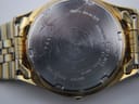 Close-up rear view of the stainless steel case back, showing Seiko engravings including model '7N43-8A30' and serial number '433894'.