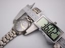 Digital caliper measuring the Seiko watch case diameter as 36.27mm.