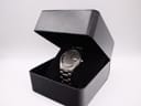 The Seiko watch displayed inside a black presentation box.